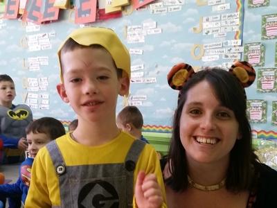 Ryan Gutman in a minion costume and woman in costume